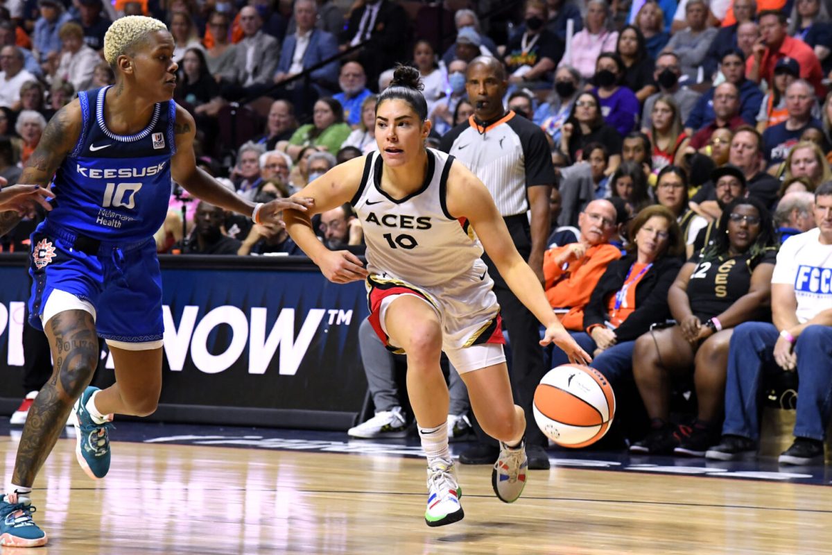 Kelsey Plum,#10 of the Las Vegas Aces, handles the ball during Game 4 of the 2022 WNBA Finals on September 18, 2022 at Mohegan Sun Arena in Uncasville, CT. She is a proponent of equal pay explaining that women aren't asking for the same pay as men; they want the same percentage of revenue shared. Copyright 2022 NBAE (Photo by Brian Babineau/NBAE via Getty Images)